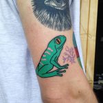 Green frog tattoo