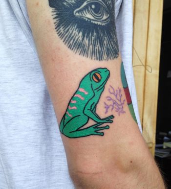 Green frog tattoo