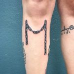 Hanging chain tattoo