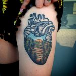 Heart and a river landscape tattoo