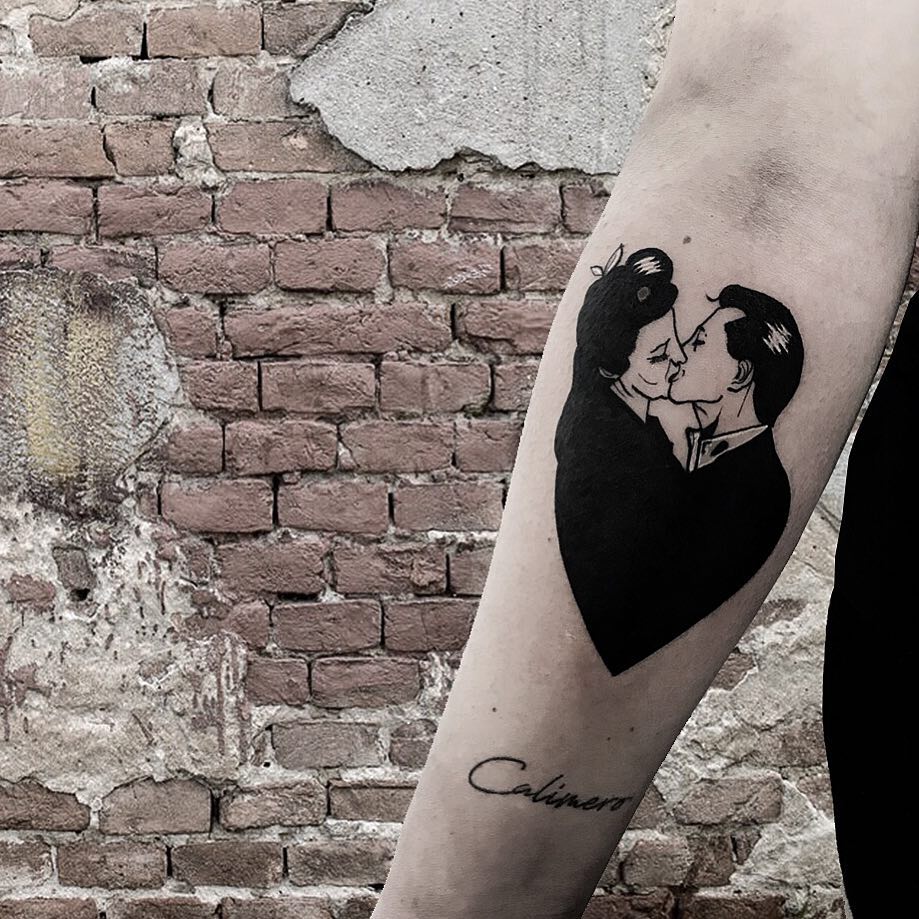 Heart shaped lovers tattoo