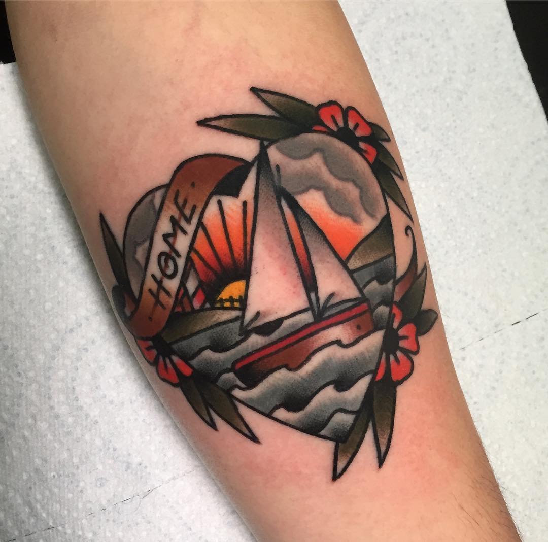 Heart shaped tattoo of a boat