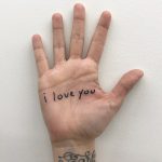 I love you tattoo on the palm