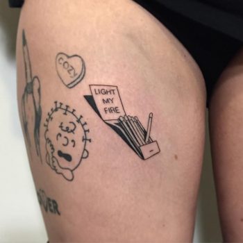 Light my fire tattoo on the thigh