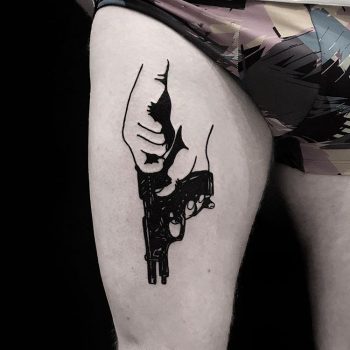 Black dagger on the thigh - Tattoogrid.net