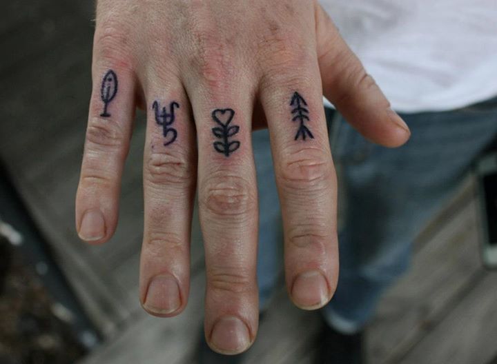Lovely small symbol tattoos