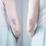 Matching forget me not and lavender tattoos