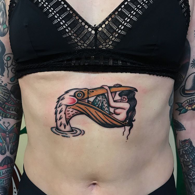 Mermaid and pelican tattoo