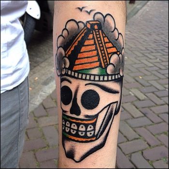 Mesoamerican pyramid and skull tattoo