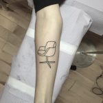 Minimalist swivel chair tattoo