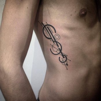 Minimalist abstract tattoo on the rib cage