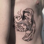 Mother child and a cobra tattoo