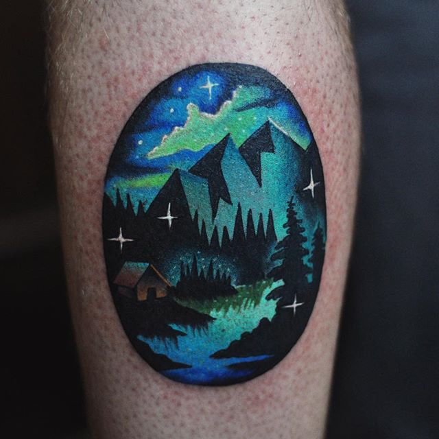 Northern lights landscape tattoo