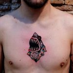 Old school shark tattoo on the chest