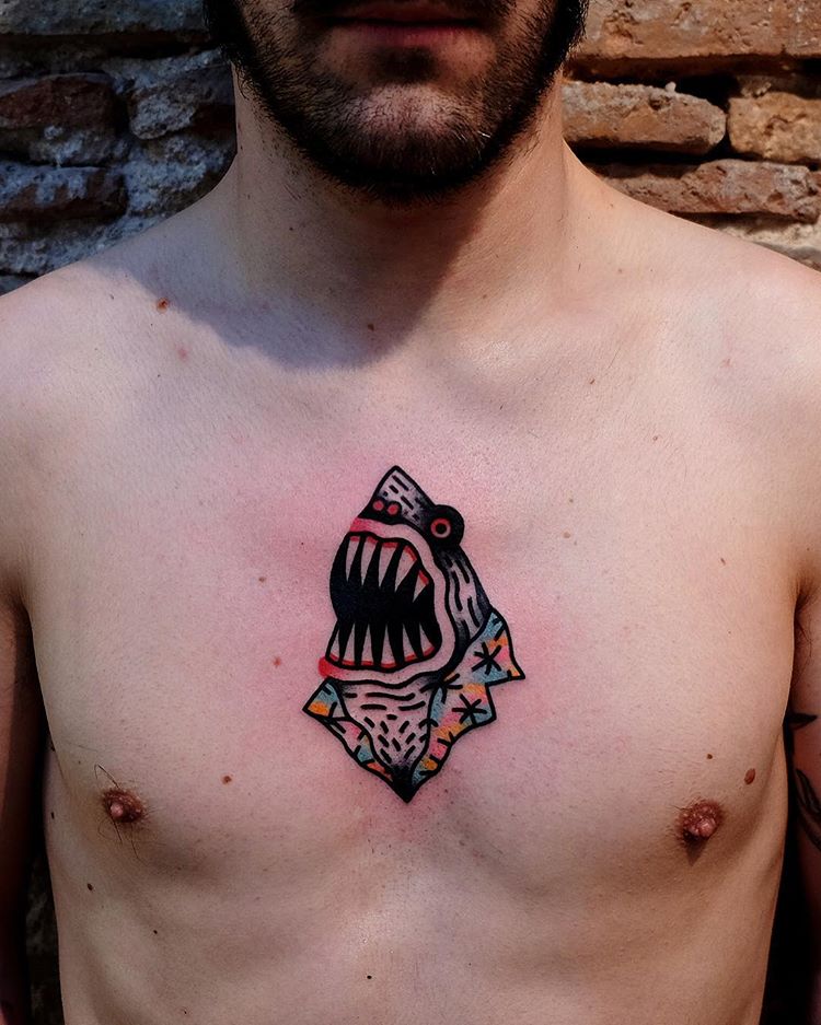 Old school shark tattoo on the chest