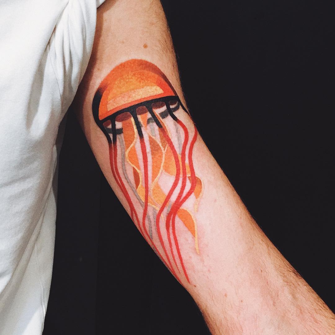 Orange jellyfish tattoo