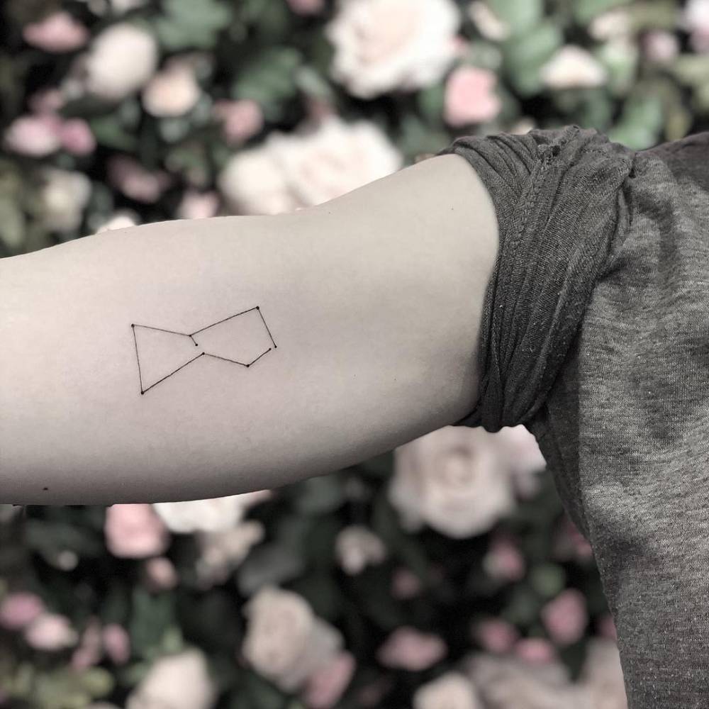Orion constellation tattoo on the right bicep