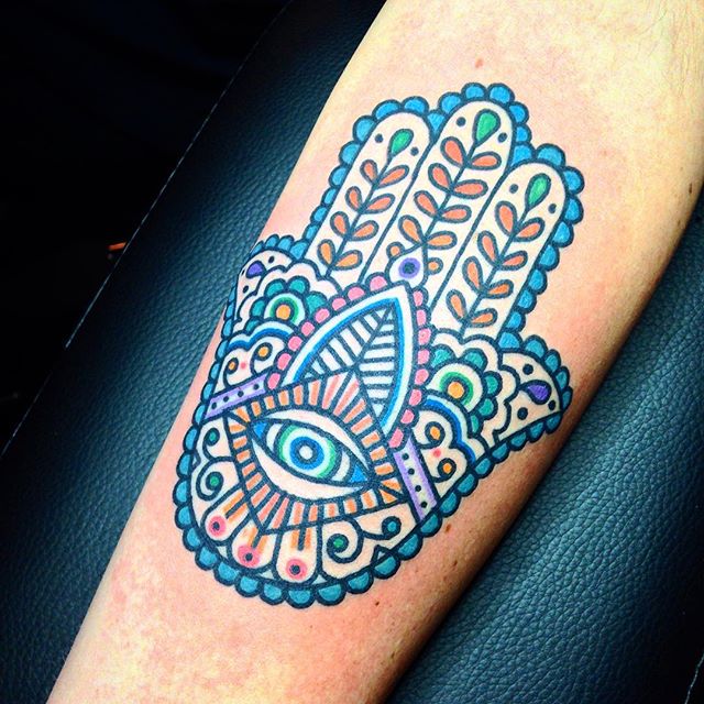A tiny Hamsa tattoo below the thumb ensures that its wearer will always be  able to see it and admire it | Ratta Tattoo