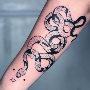 Ornamental floral snake tattoo