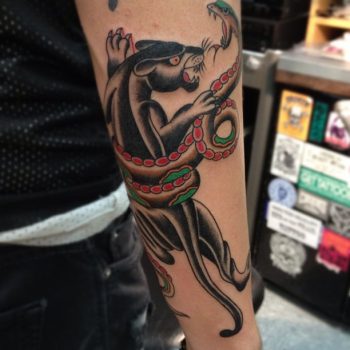Panther and snake tattoo
