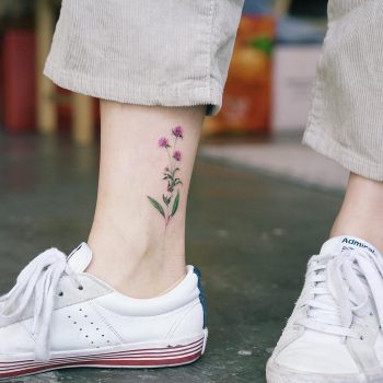 Purple and green flower on the ankle
