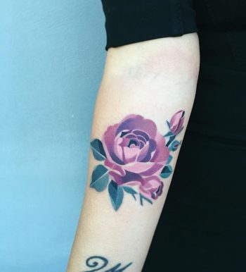 Purple watercolor rose tattoo