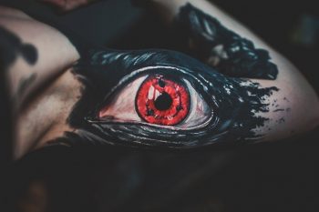 Realistic eye tattoo on the bicep