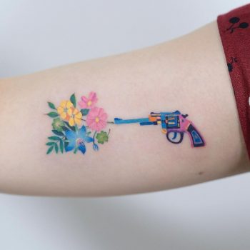 Revolver and flowers