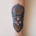Rich cat tattoo