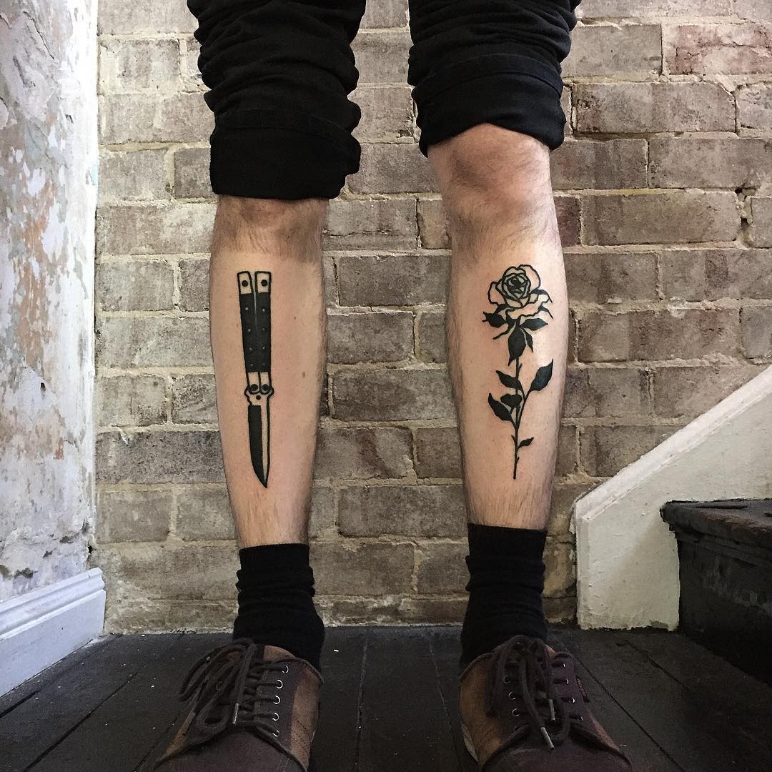 Rose and butterfly knife tattoos