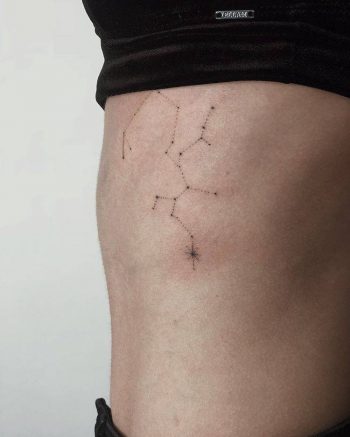 Sagittarius constellation tattoo on the side