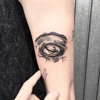 Saturn as an eyeball tattoo