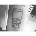 Shark in a glass tattoo