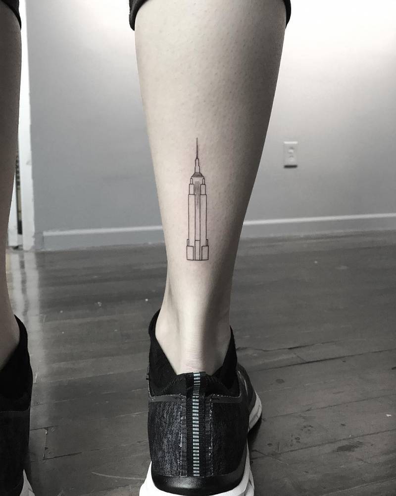 Skyscraper tattoo on the ankle