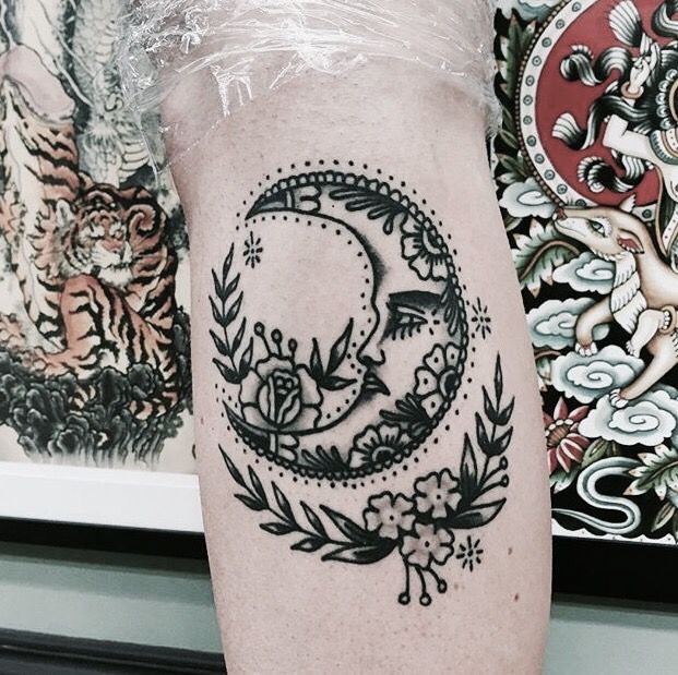 Stylized crescent moon and flowers