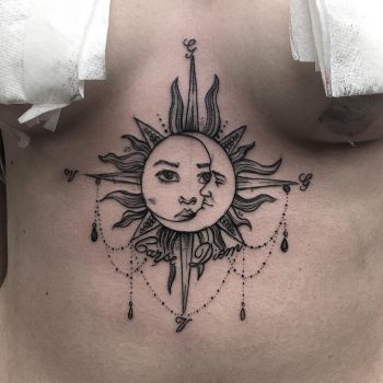 Sun and moon tattoo on the sternum