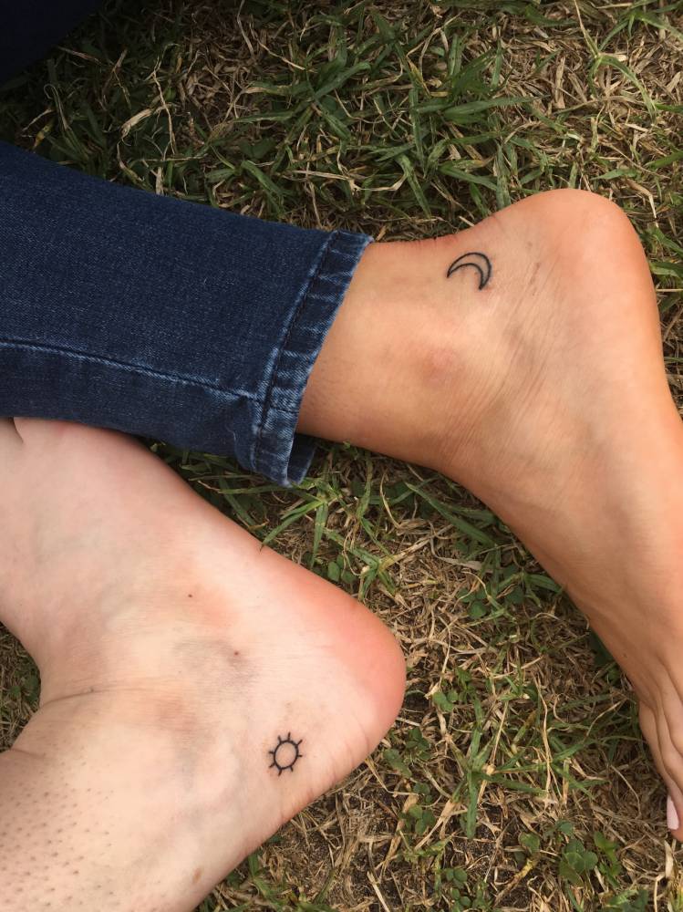 Sun and moon tattoos on feet