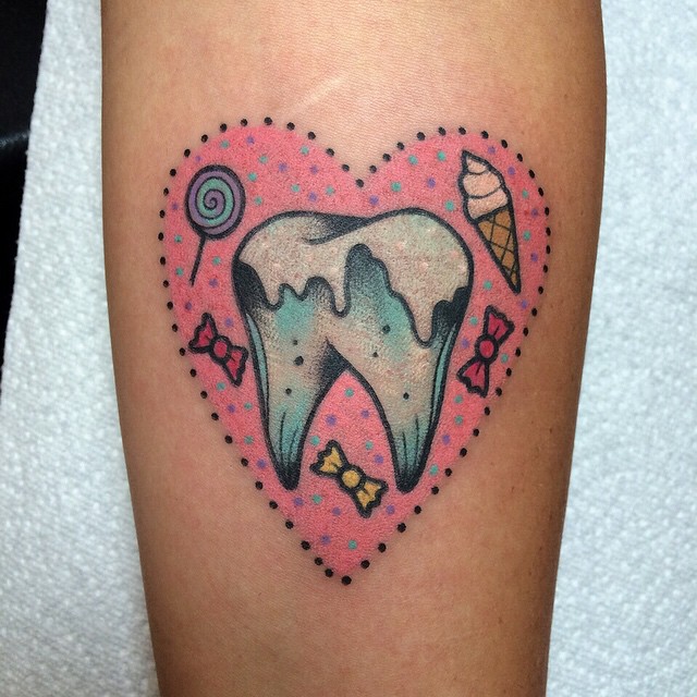 Sweets and tooth tattoo