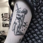 Sword stabbed woman tattoo