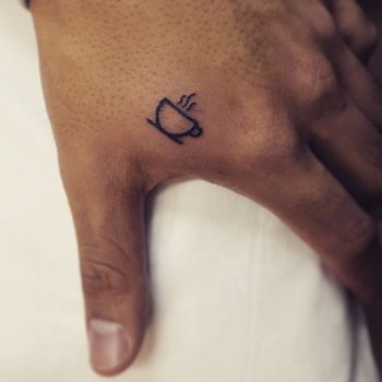 Tiny coffee cup tattoo