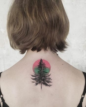 Tree and pink circle tattoo