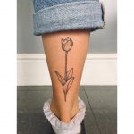 Tulip tattoo on the calf