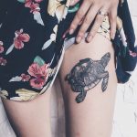 Turtle tattoo on the left thigh
