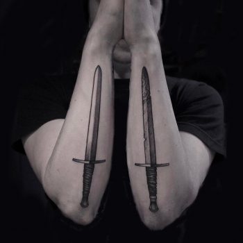 Two short sword tattoos