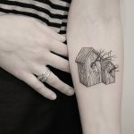 Two wooden bird houses tattoo