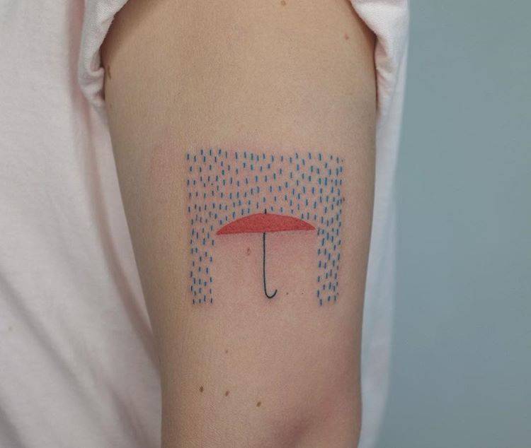 Umbrella and rain tattoo