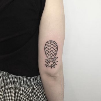 Upside down pineapple tattoo