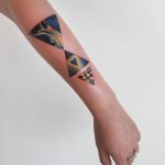 Vaporwave style triangles tattoo