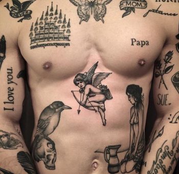 Various black tattoos on the front