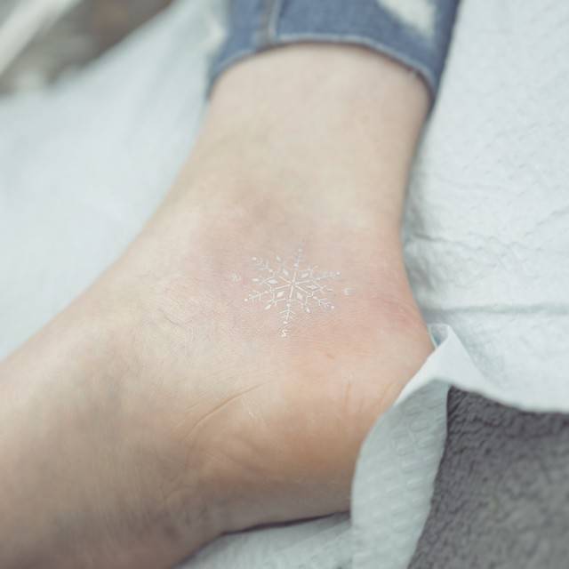 White snowflake on the ankle